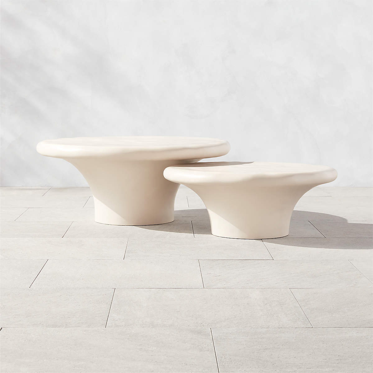 2-Piece Pompeo Round Ivory Cast Resin Nesting Indoor Outdoor Coffee Table Set